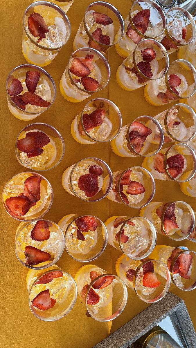 Fresh strawberry-mint coolers in glasses at a Honest event